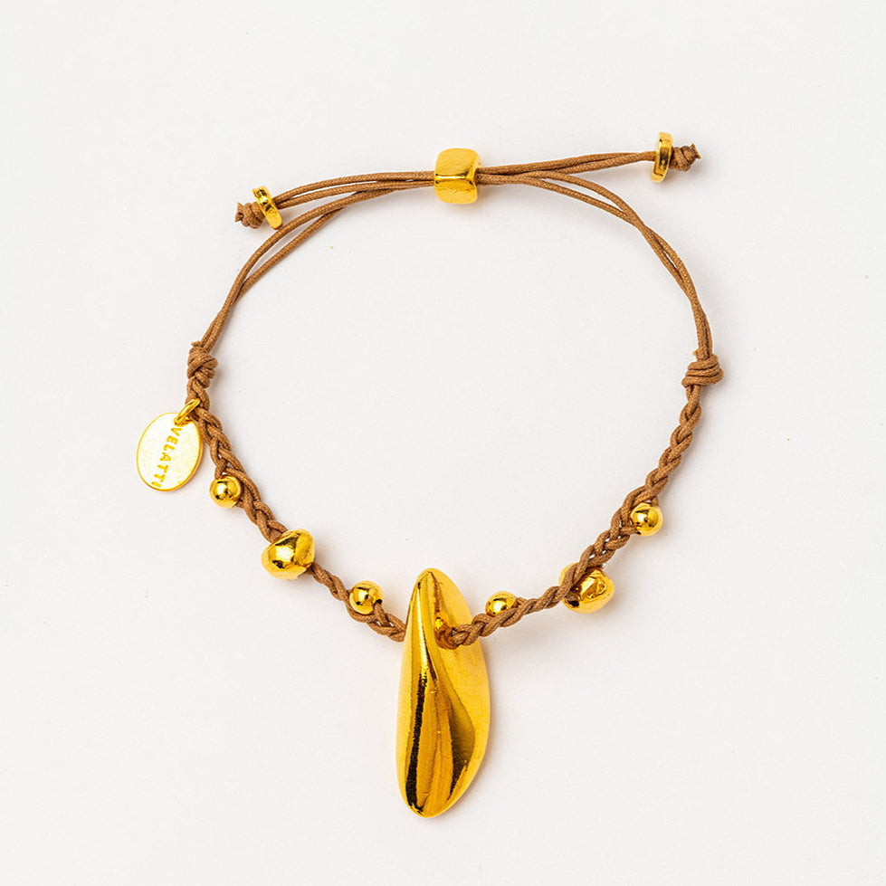 handbraided bracelet with gold accents