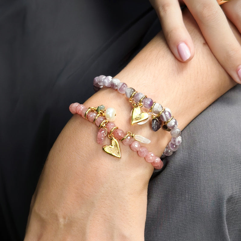 Aquamarine gemstone gold bracelet with a retailer gold heart charm