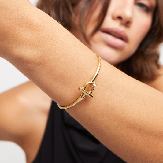 Uno de 50 gold plated bangle with topaz