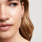 uno de 50 gold plated t -bar hoop earrings with topaz