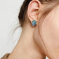 UNOde50 Stud Earrings with Blue Oval Crystals