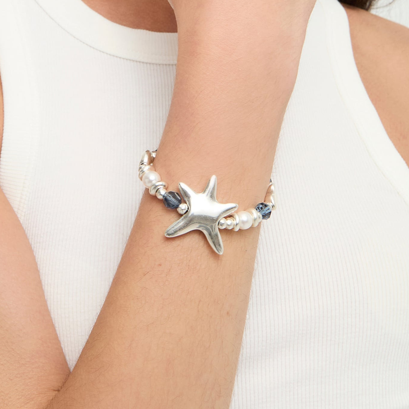 silver plated star bracelet with blue crystals
