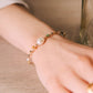hand-braided bracelet with gemstones and pearl