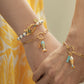 Velatti Gem & Fish Charm Bracelet